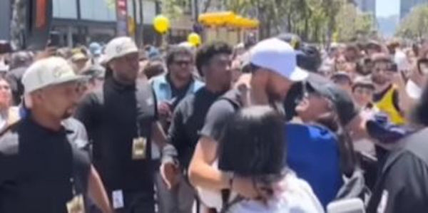 Watch A Fan Try To Kiss Steph Curry