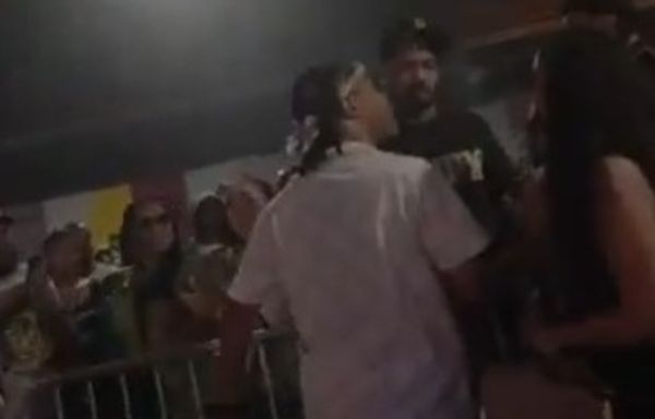 Watch T.I. Leap Off The Stage To Save Tiny